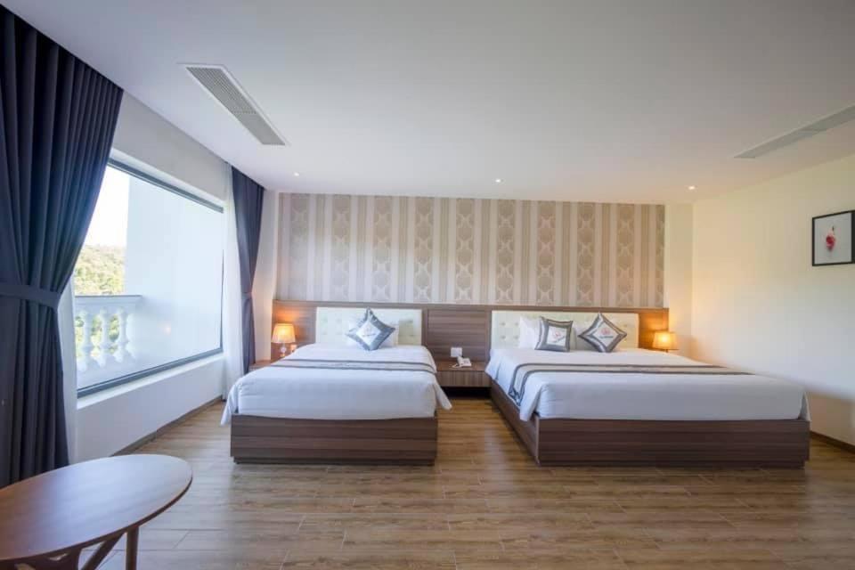 Um-Pq Hotel Дуонг-Донг Экстерьер фото