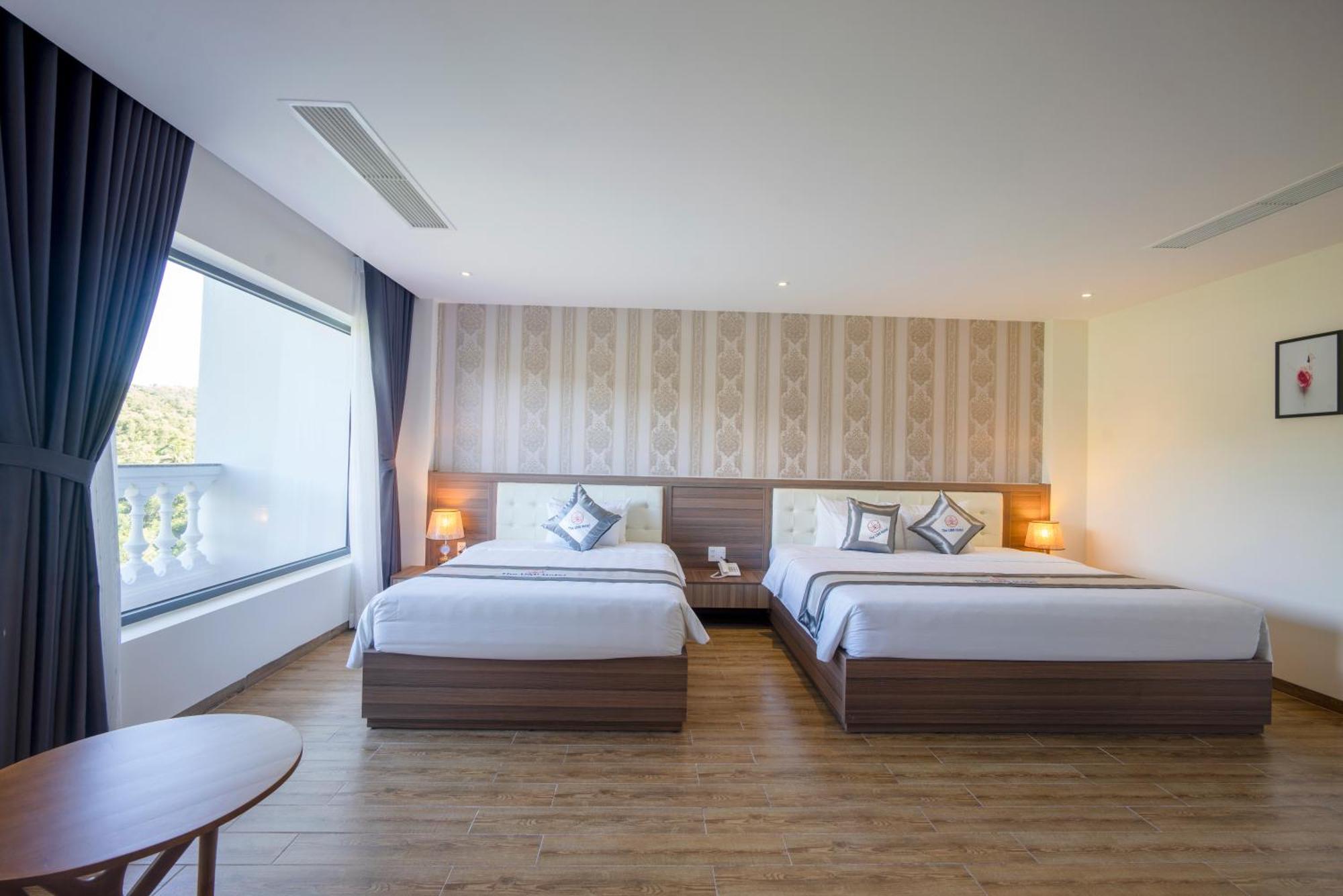 Um-Pq Hotel Дуонг-Донг Экстерьер фото
